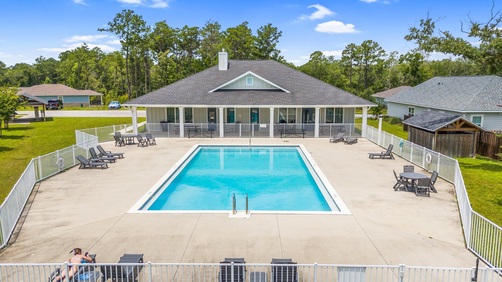 378 Marquis Way Freeport, FL 32439 - Photo 37 of 37 a view of a house with swimming pool and sitting area