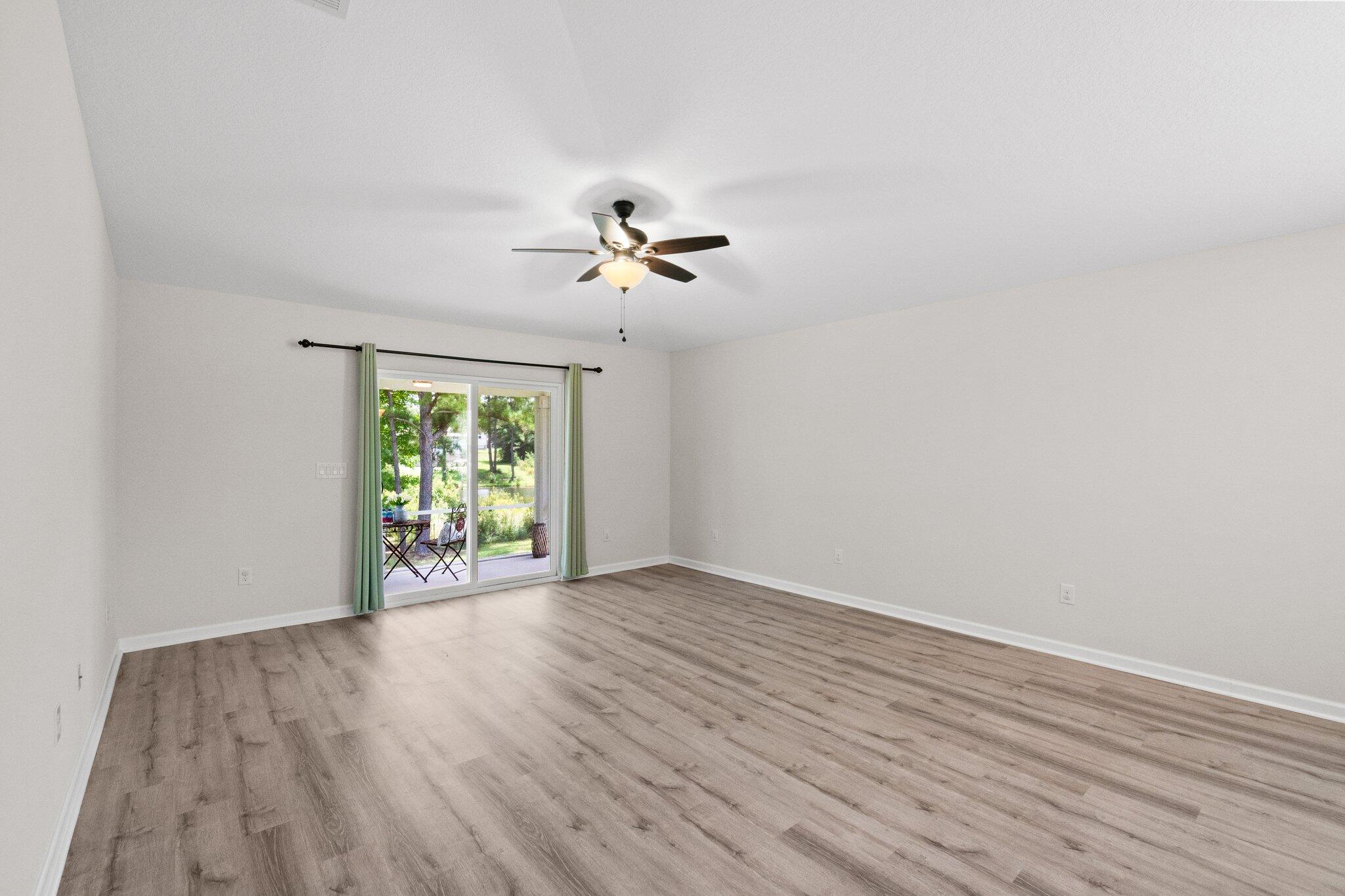 378 Marquis Way Freeport, FL 32439 - Photo 10 of 37 a view of an empty room with a window