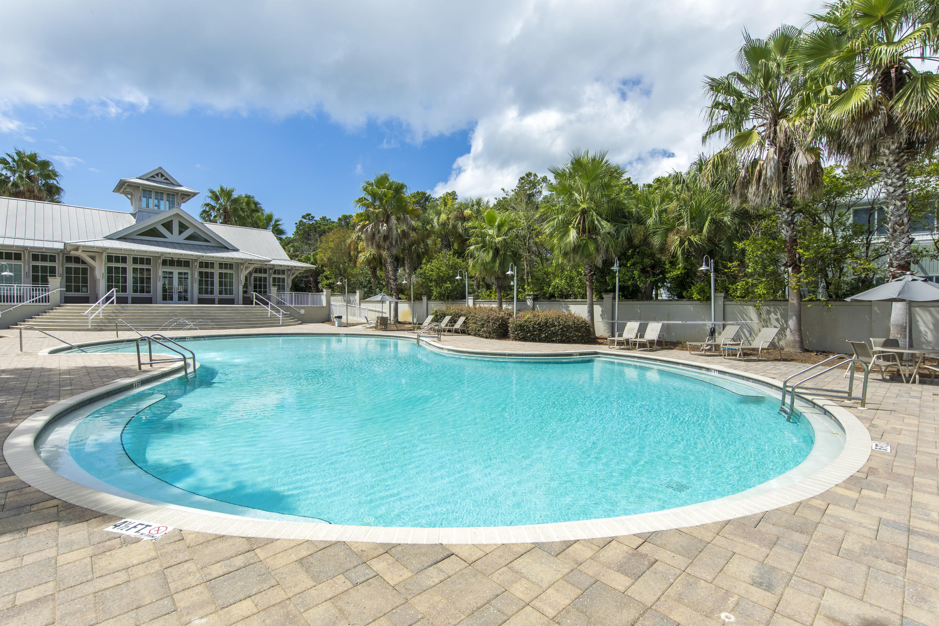 276 Grande Pointe Circle Inlet Beach, FL 32461 - Photo 30 of 33 a view of a swimming pool with a patio