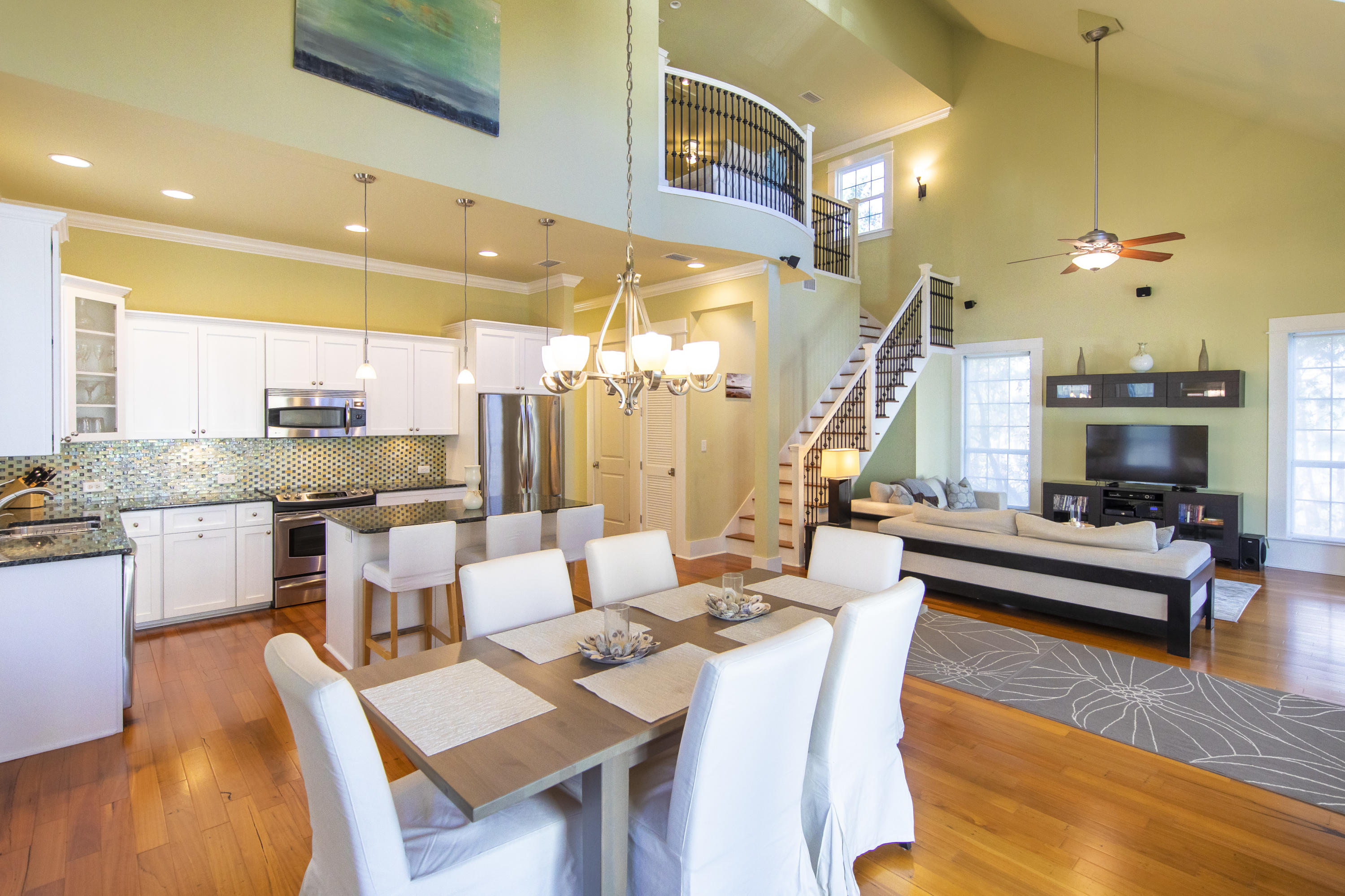 276 Grande Pointe Circle Inlet Beach, FL 32461 - Photo 5 of 33 a living room with lots of furniture and kitchen view
