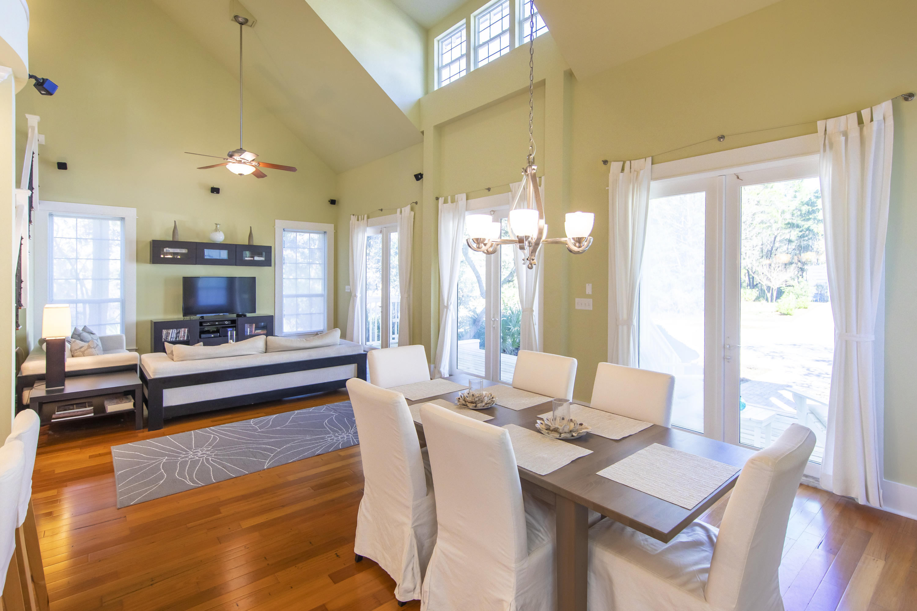 276 Grande Pointe Circle Inlet Beach, FL 32461 - Photo 7 of 33 a view of a dining room with furniture window and wooden floor