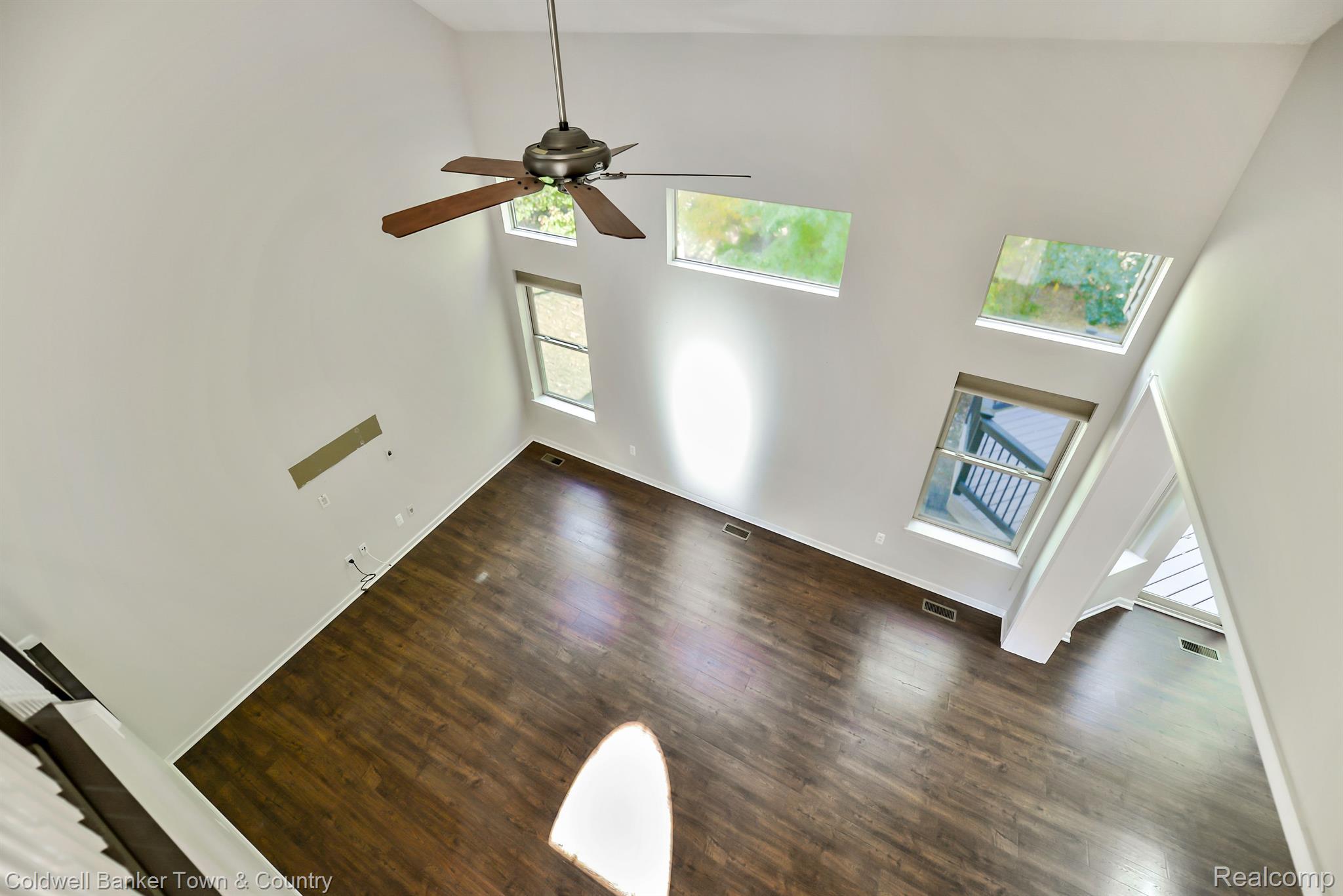 213 Slider Avenue Howell, MI 48843 - Photo 38 of 64 Two-story living room