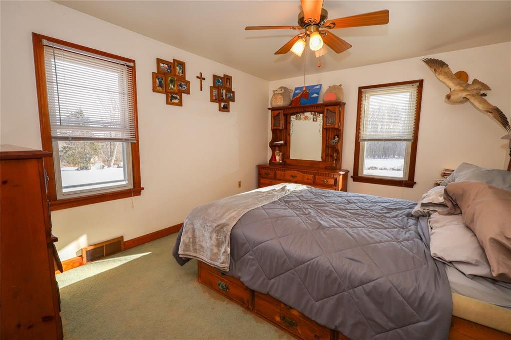 521 Mercer-New Wilmington Road Mercer, PA 16137 - Photo 11 of 35 a bedroom with a bed and a window