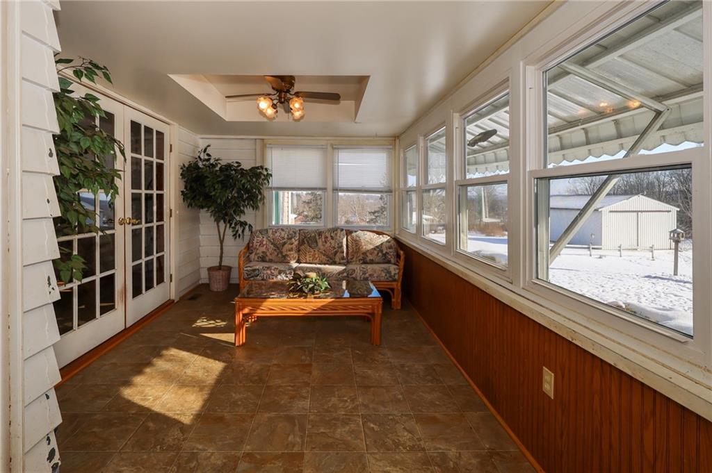 521 Mercer-New Wilmington Road Mercer, PA 16137 - Photo 16 of 35 a balcony with furniture and a potted plant