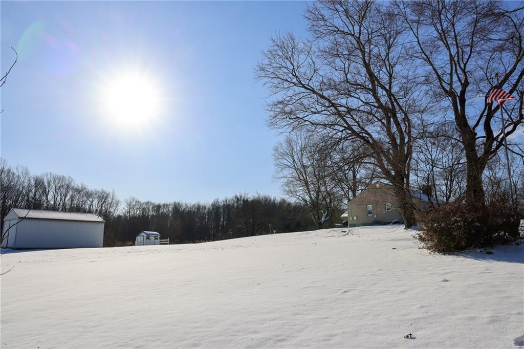521 Mercer-New Wilmington Road Mercer, PA 16137 - Photo 34 of 35 a view of terrace with trees