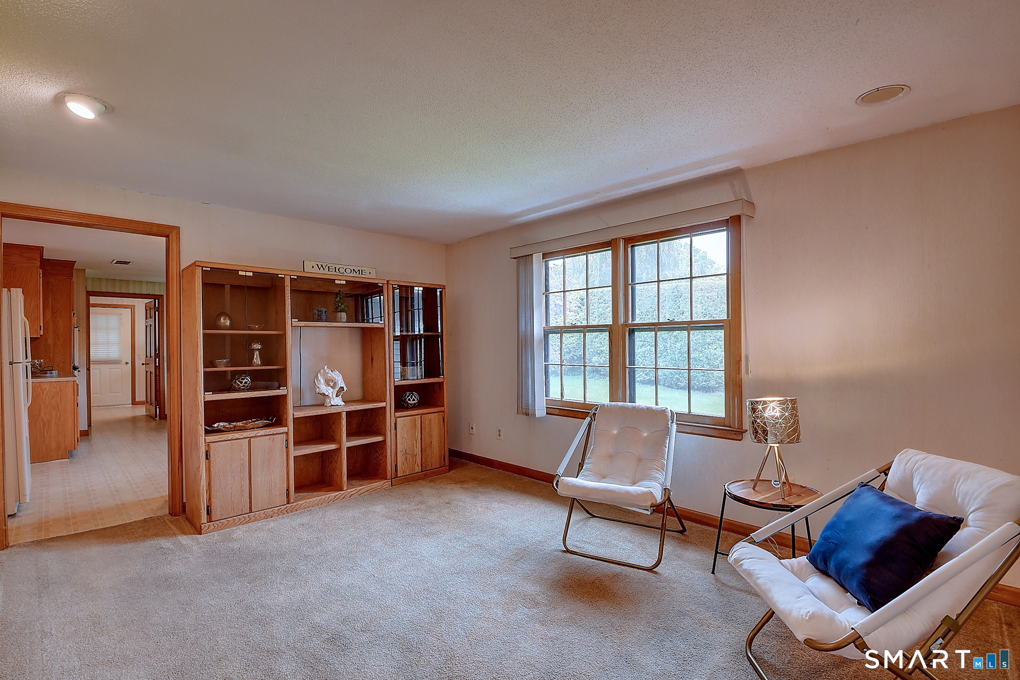80 Grist Mill Road Wethersfield, CT 06109 - Photo 17 of 40 a living room with a furniture and a window
