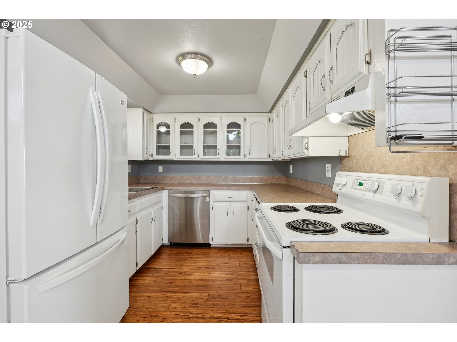 1510 Deborah Road, Unit 4 Newberg, OR 97132 - Photo 11 of 26 a kitchen with stainless steel appliances granite countertop a sink and cabinets