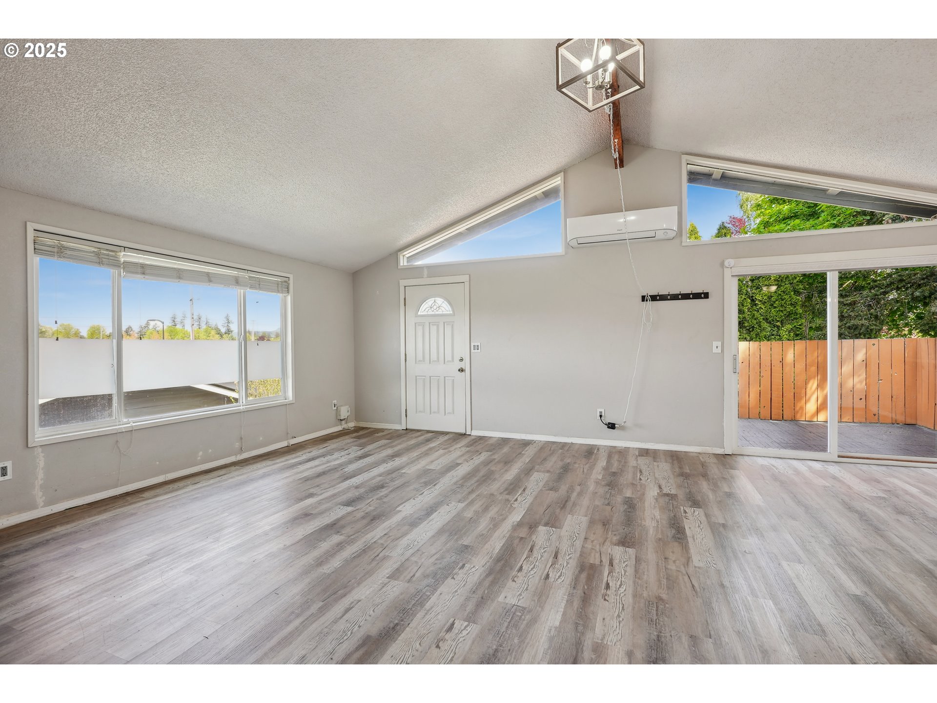 1510 Deborah Road, Unit 4 Newberg, OR 97132 - Photo 15 of 26 a view of an empty room with wooden floor and a window