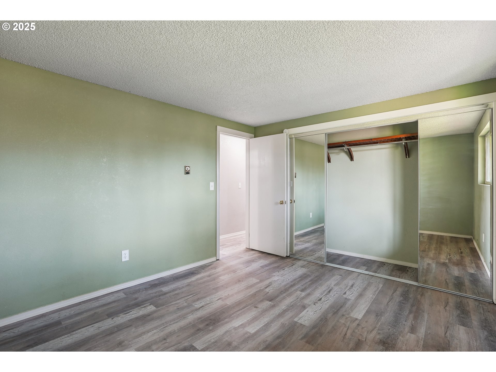 1510 Deborah Road, Unit 4 Newberg, OR 97132 - Photo 17 of 26 a view of an empty room with wooden floor