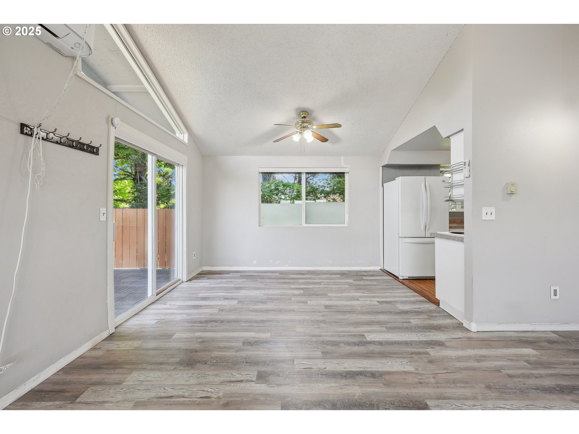1510 Deborah Road, Unit 4 Newberg, OR 97132 - Photo 8 of 26 a view of empty room with wooden floor and fan