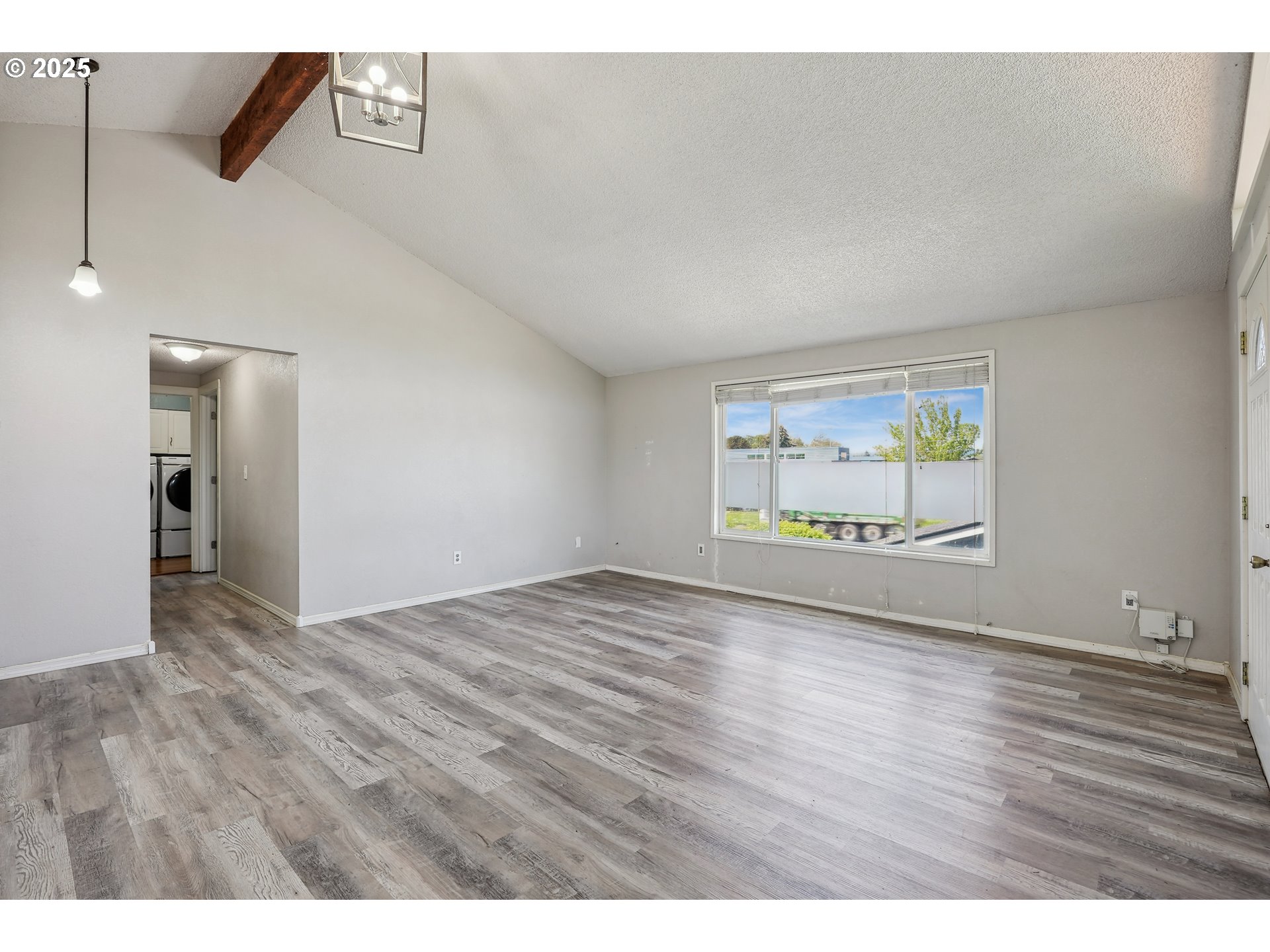 1510 Deborah Road, Unit 4 Newberg, OR 97132 - Photo 10 of 26 a view of an empty room and wooden floor