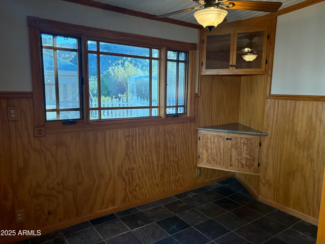a view of a door and wooden floor