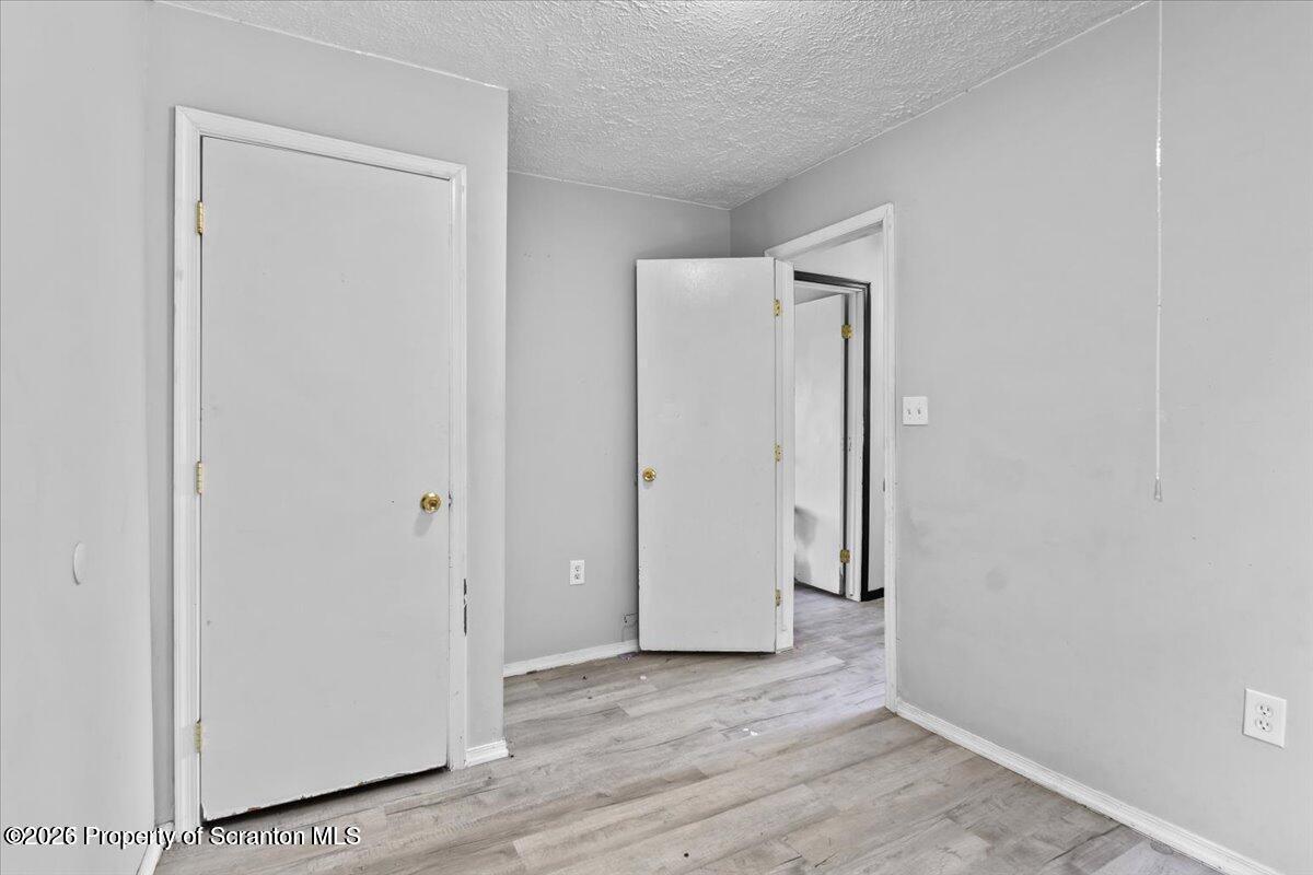 416 Electric Street Scranton, PA 18509 - Photo 6 of 9 a view of an empty room