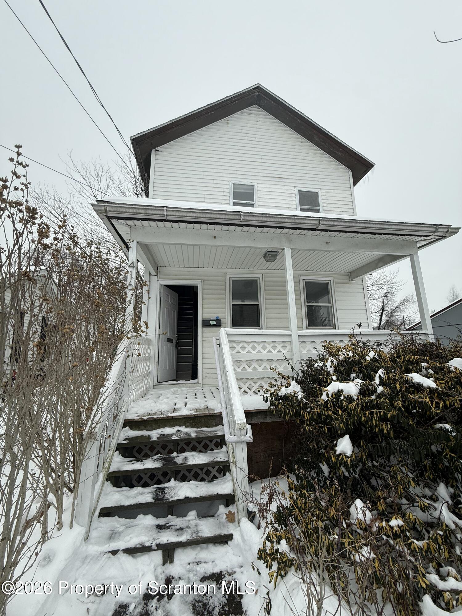416 Electric Street Scranton, PA 18509 - Photo 9 of 9 a front view of house with stairs