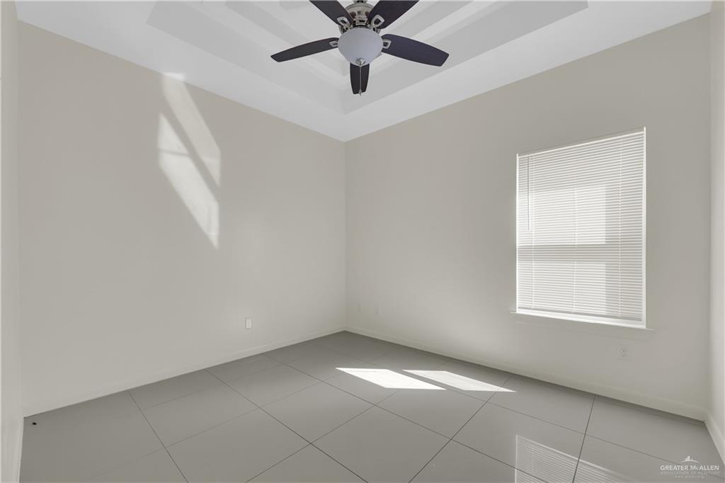 1017 East Myrtle Beach Avenue McAllen, TX 78503 - Photo 13 of 18 a view of an empty room with a window