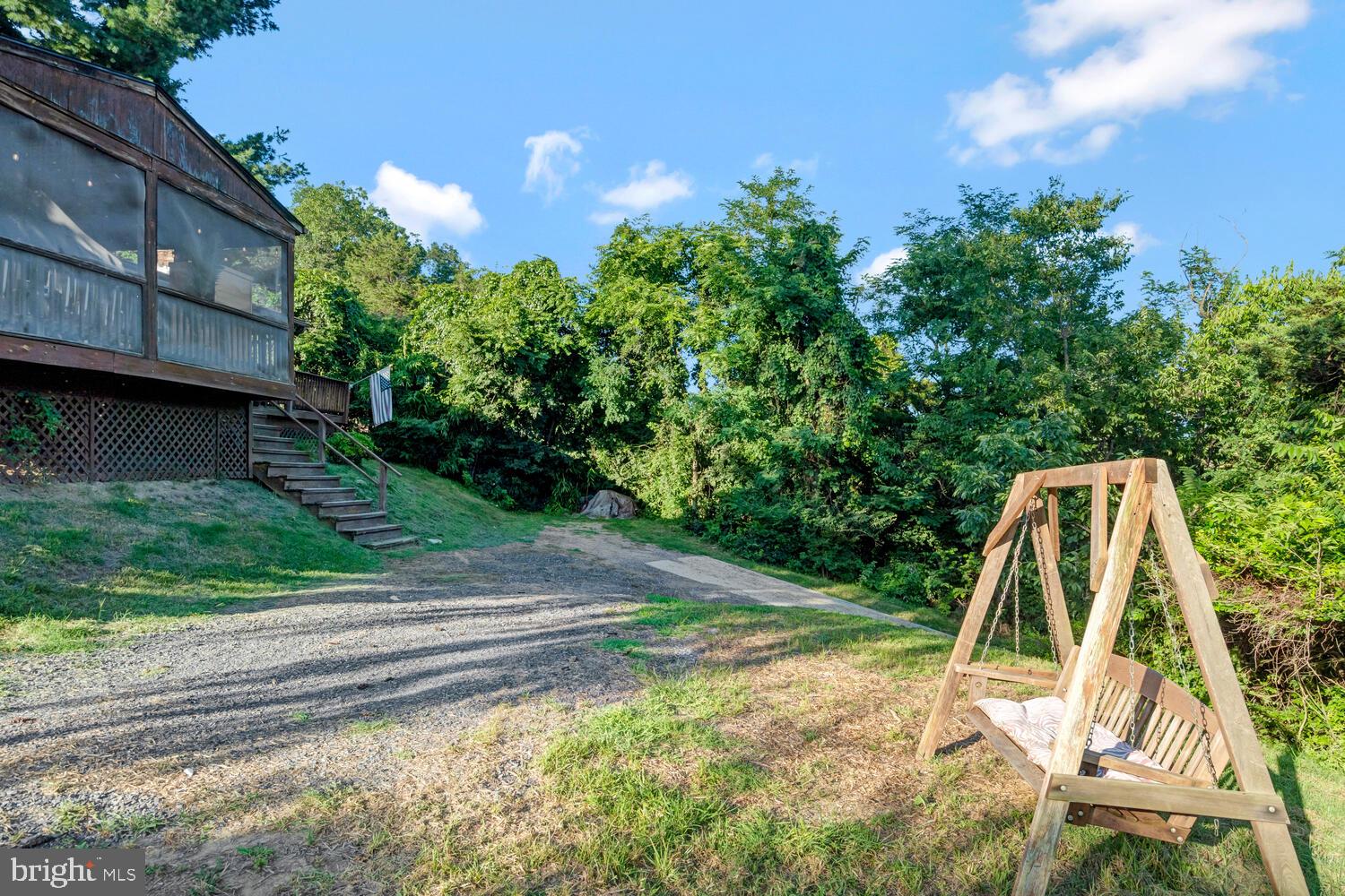 6235 South Page Valley Road Luray, VA 22835 - Photo 34 of 52 Serene retreat with lush greenery.