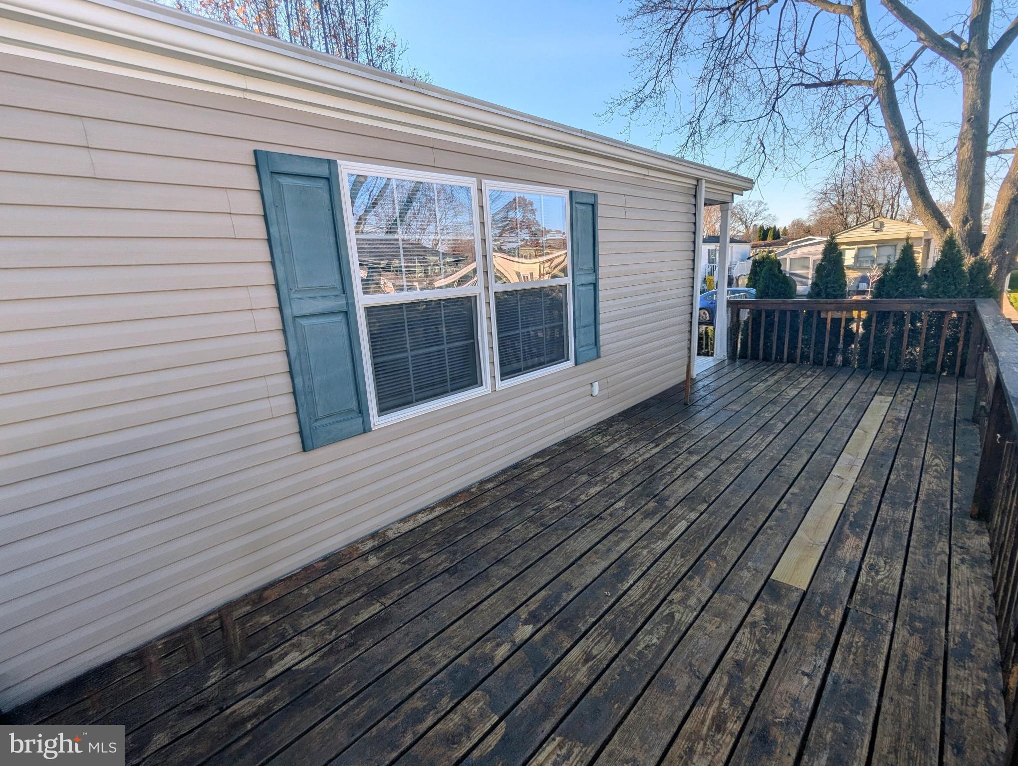 107 Trailway Road Middle River, MD 21220 - Photo 6 of 29 Sunny deck with greenery for privacy