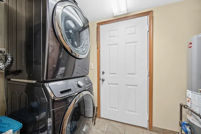a view of storage and utility room with washer and dryer