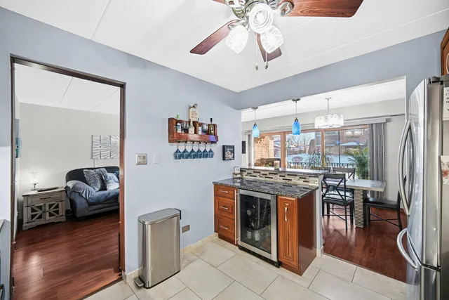 a view of a livingroom with furniture window and wooden floor