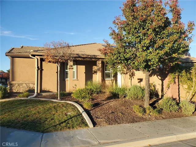 a view of a couches under an umbrella