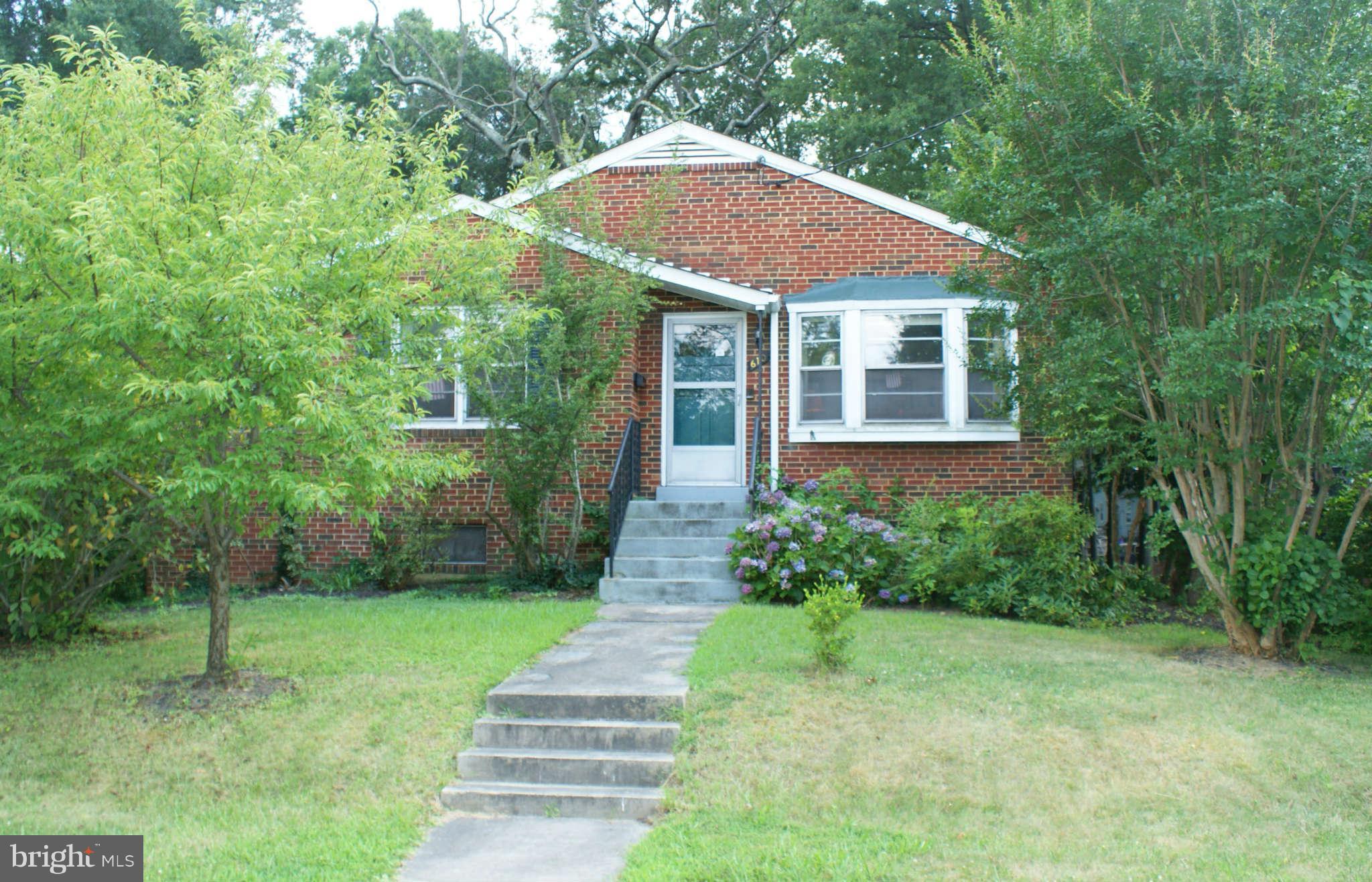 610 Park Avenue Laurel, MD 20707 - Photo 1 of 3 a view of a house with garden