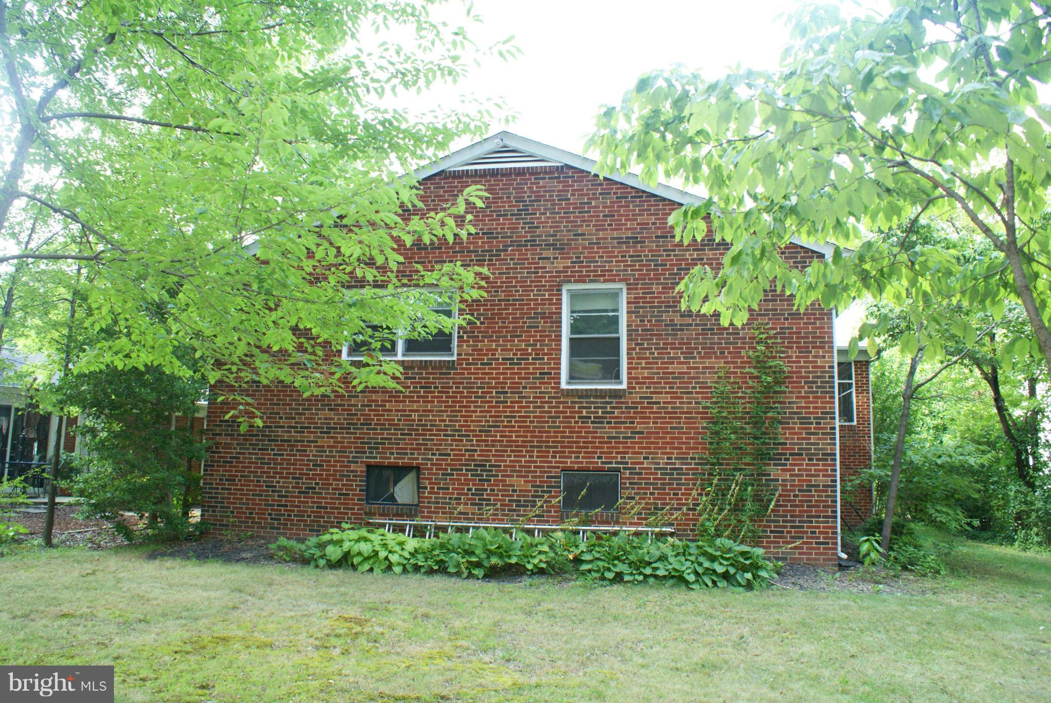 610 Park Avenue Laurel, MD 20707 - Photo 2 of 3 front view of a house with a yard