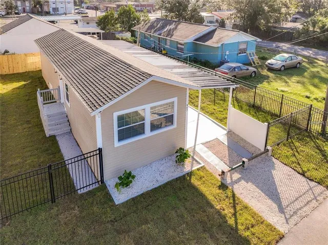 an aerial view of a house with garden