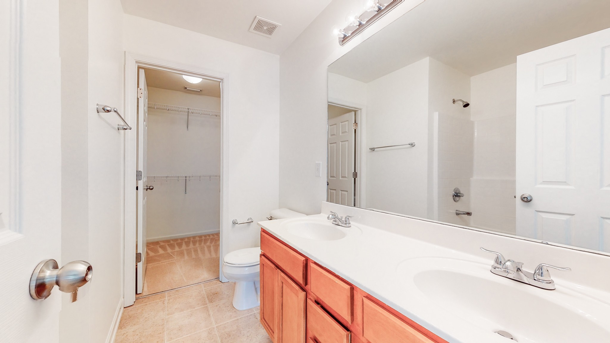 1382 Rural Hill Road, Unit 186 Antioch, TN 37013 - Photo 13 of 21 a spacious bathroom with a granite countertop sink a toilet and a large mirror