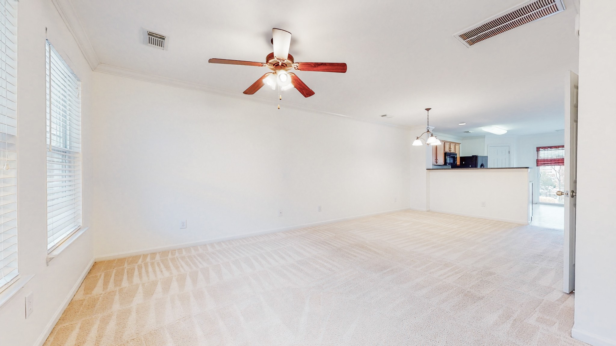 1382 Rural Hill Road, Unit 186 Antioch, TN 37013 - Photo 4 of 21 a view of empty room with wooden floor and windows