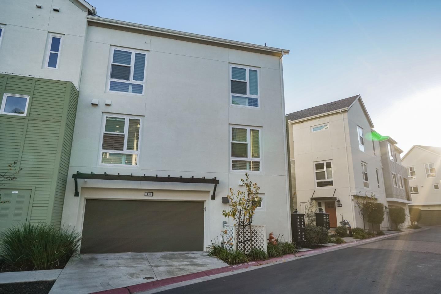 416 Neves Road San Mateo, CA 94403 - Photo 2 of 40 a front view of a house with a yard