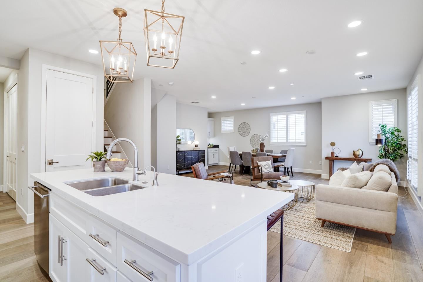 416 Neves Road San Mateo, CA 94403 - Photo 18 of 40 a living room with furniture a chandelier and a view of living room