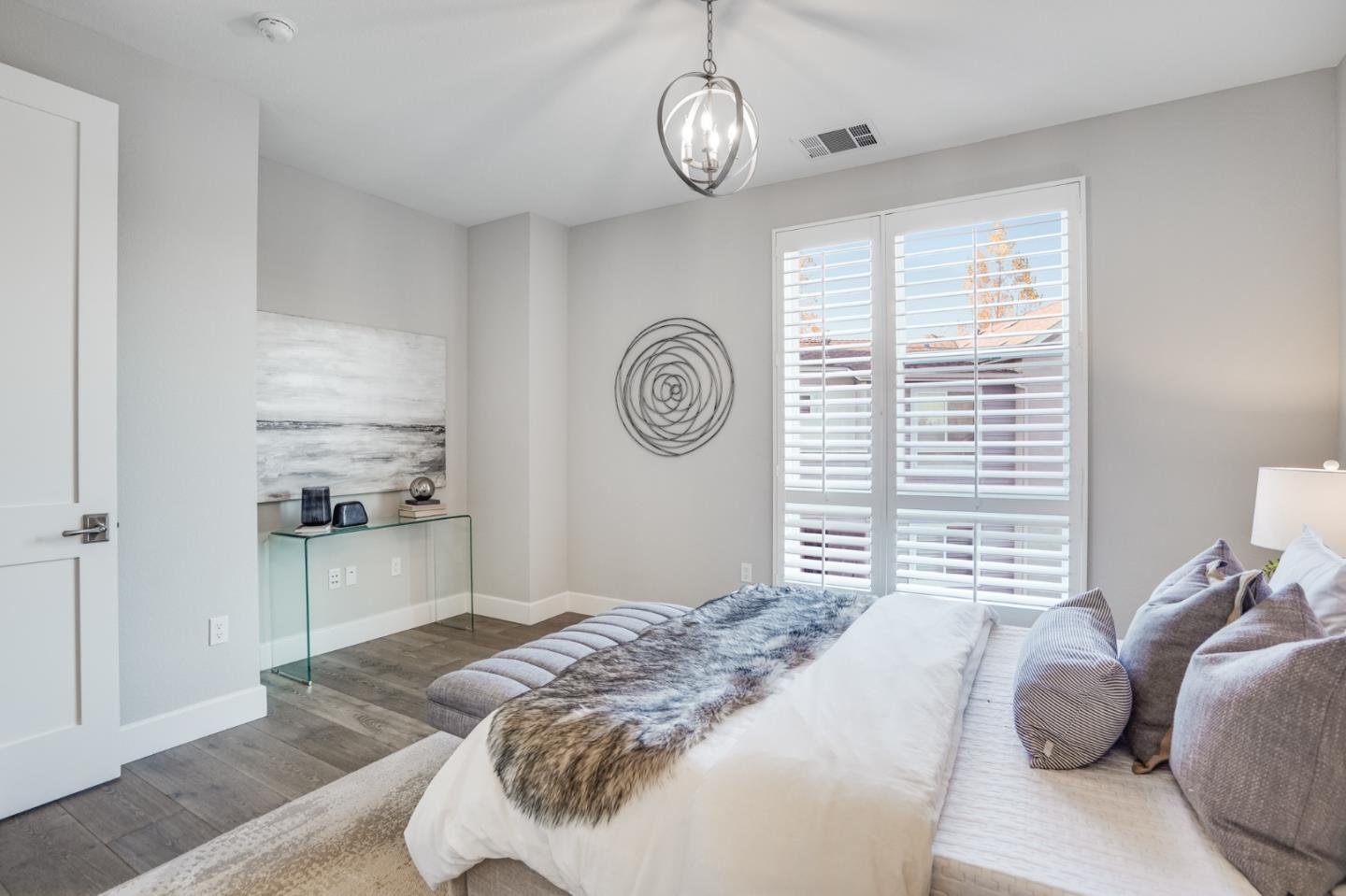 416 Neves Road San Mateo, CA 94403 - Photo 24 of 40 a bedroom with a bed and a large window