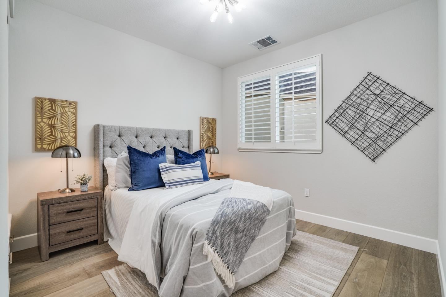 416 Neves Road San Mateo, CA 94403 - Photo 30 of 40 a bedroom with bed and a window