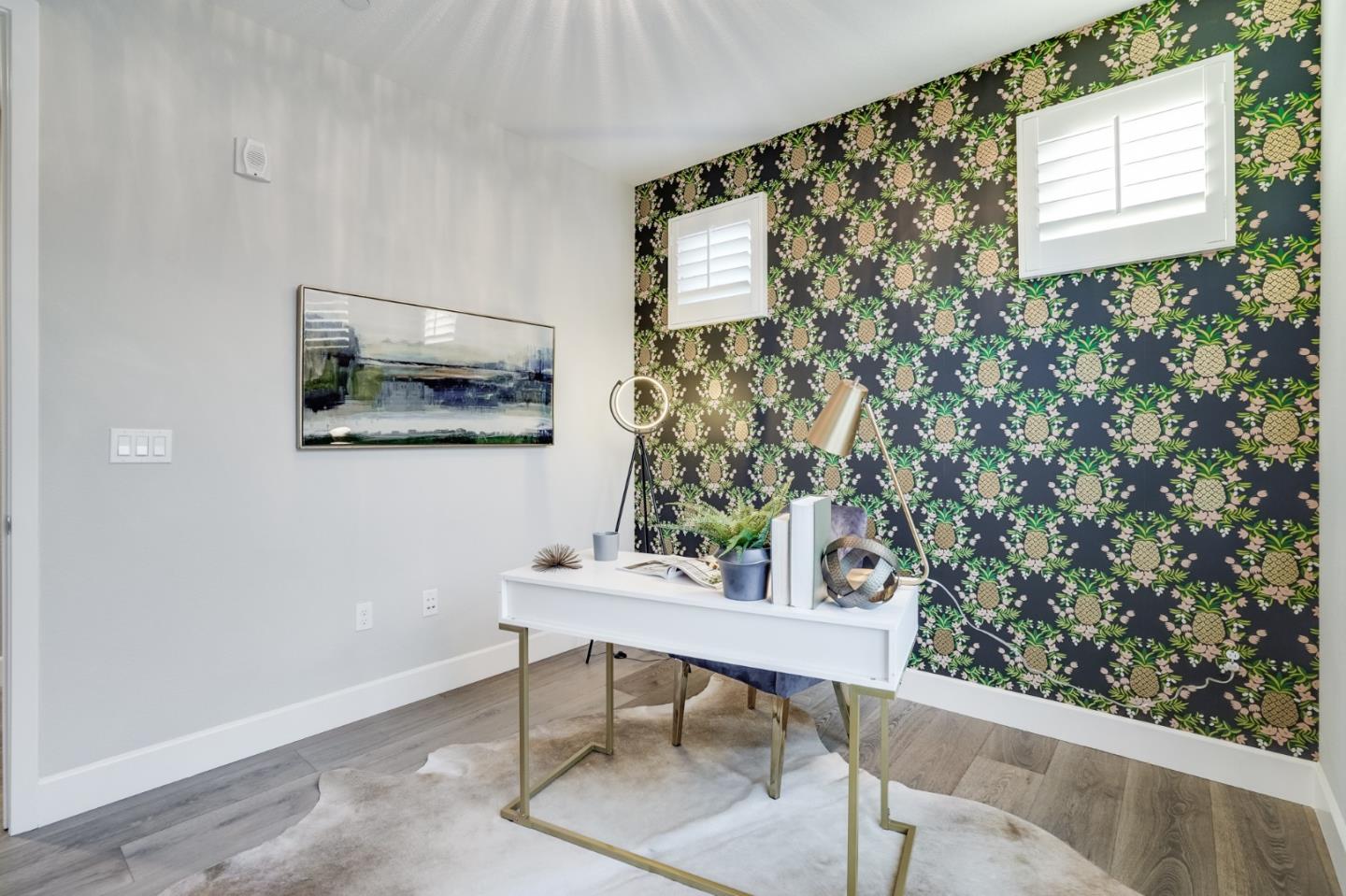 416 Neves Road San Mateo, CA 94403 - Photo 34 of 40 a workspace with furniture and a window