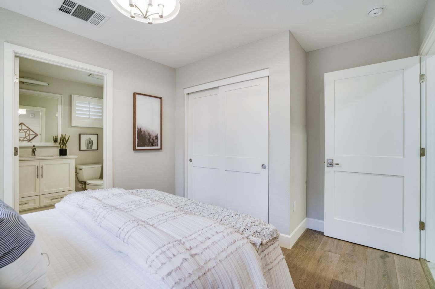 416 Neves Road San Mateo, CA 94403 - Photo 8 of 40 a bedroom with a bed and a view living room