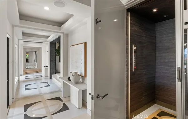 a kitchen that has a sink a stove counter top space and cabinets