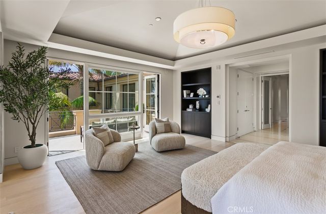 a spacious bathroom with a shower sink and mirror