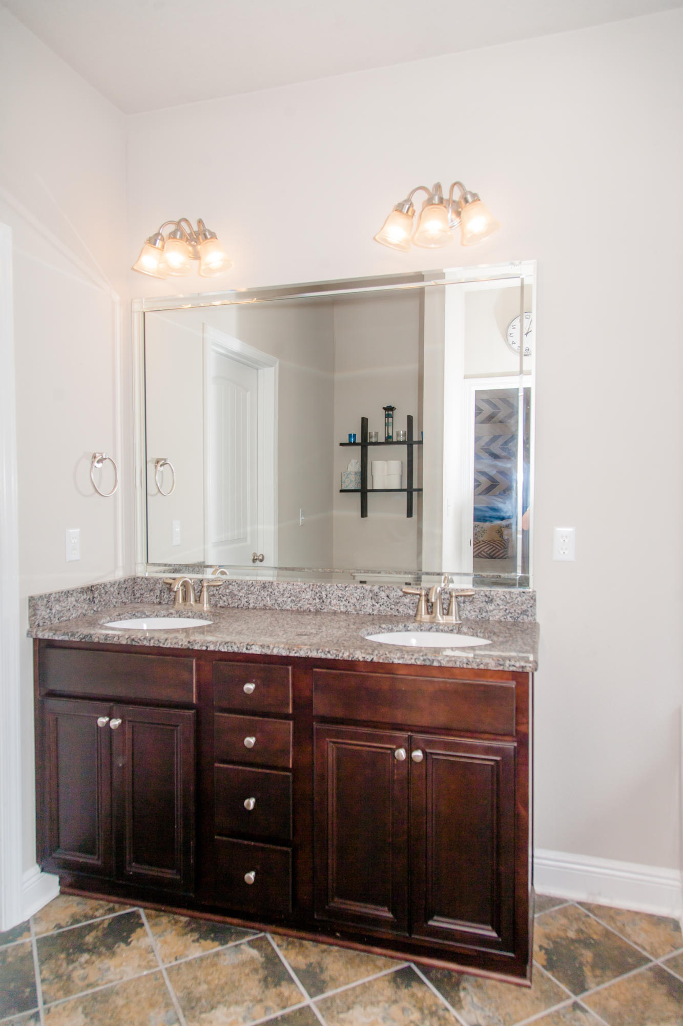 282 Whispering Lake Drive Santa Rosa Beach, FL 32459 - Photo 11 of 18 a bathroom with a granite countertop sink and a mirror