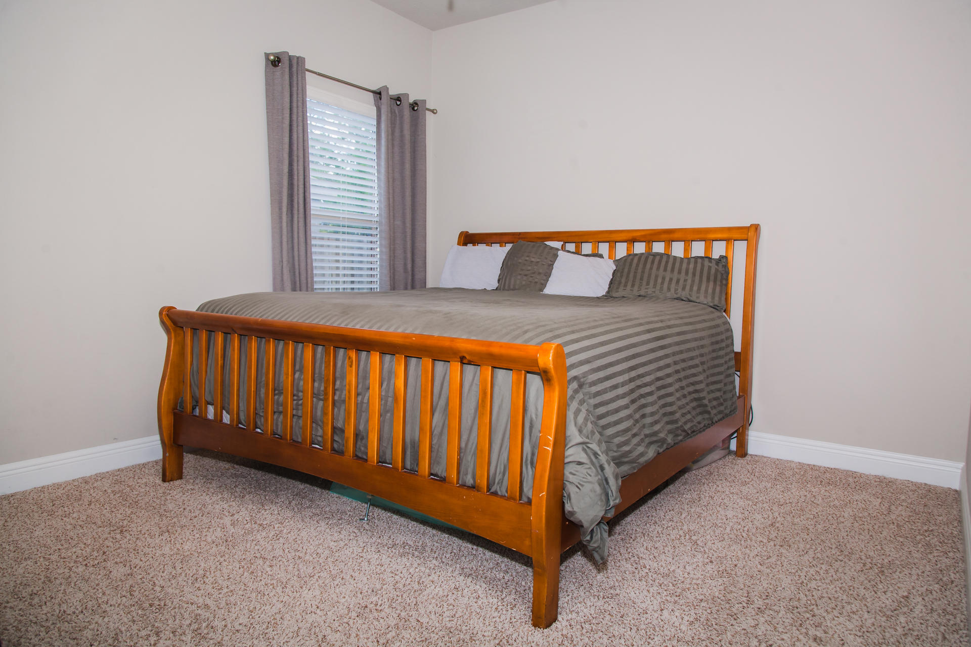282 Whispering Lake Drive Santa Rosa Beach, FL 32459 - Photo 13 of 18 a bedroom with a bed and window