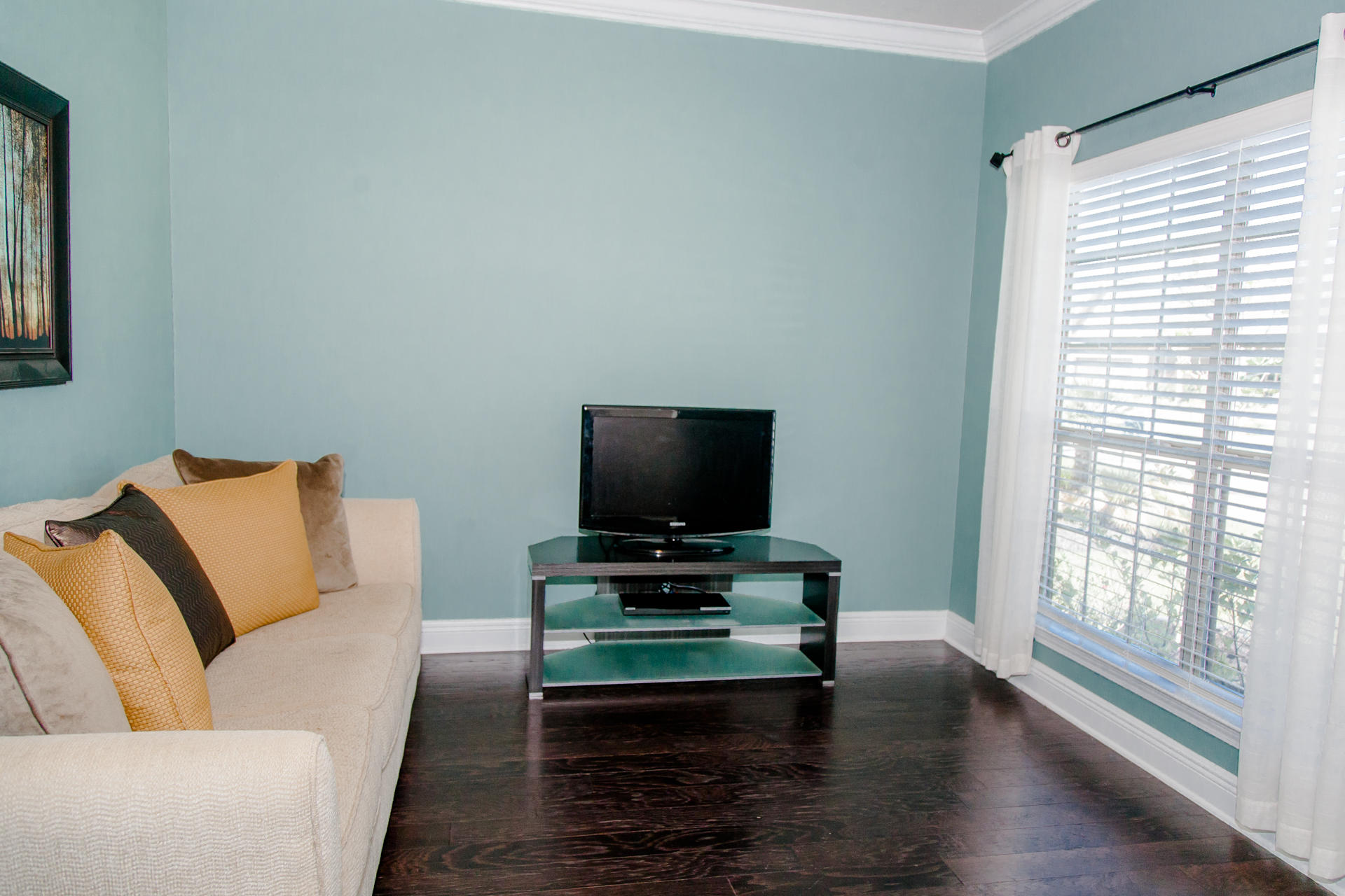 282 Whispering Lake Drive Santa Rosa Beach, FL 32459 - Photo 15 of 18 a living room with furniture and a flat screen tv