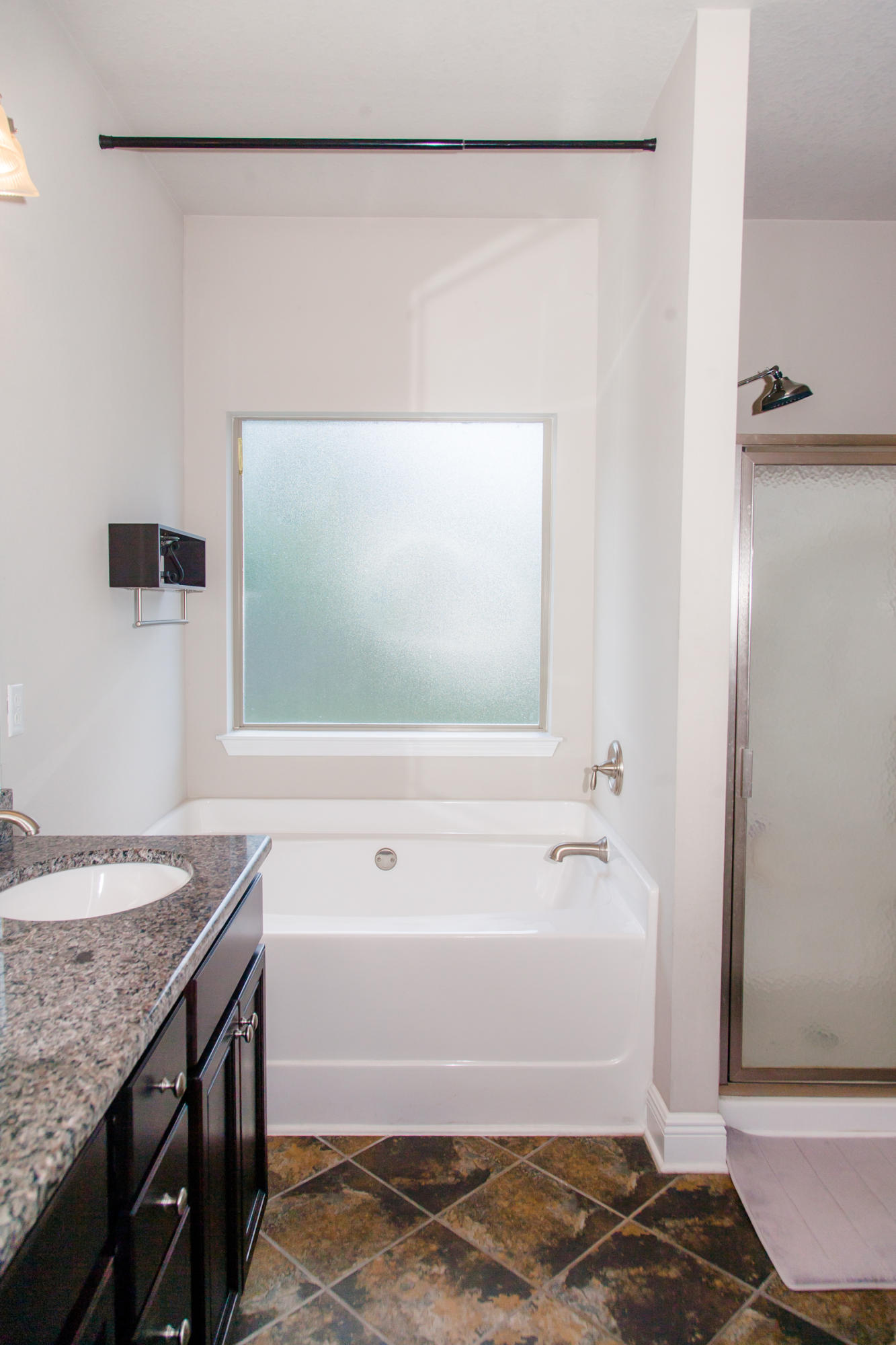 282 Whispering Lake Drive Santa Rosa Beach, FL 32459 - Photo 10 of 18 a bathroom with a granite countertop sink and a mirror
