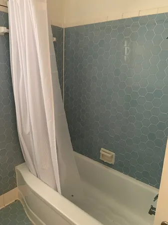a view of a bathtub in bathroom