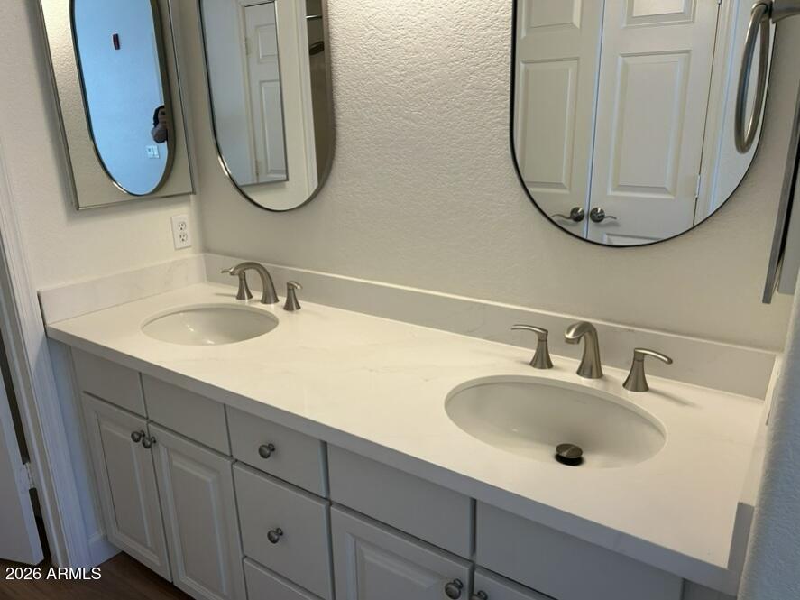425 West Rio Salado Parkway, Unit 112 Tempe, AZ 85281 - Photo 10 of 17 a bathroom with a sink and a mirror