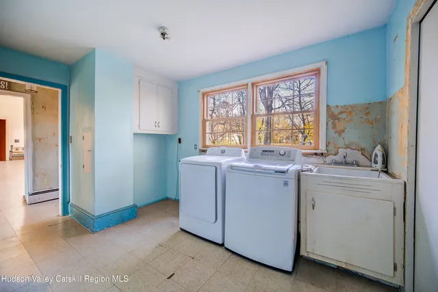 a view of cabinets and window