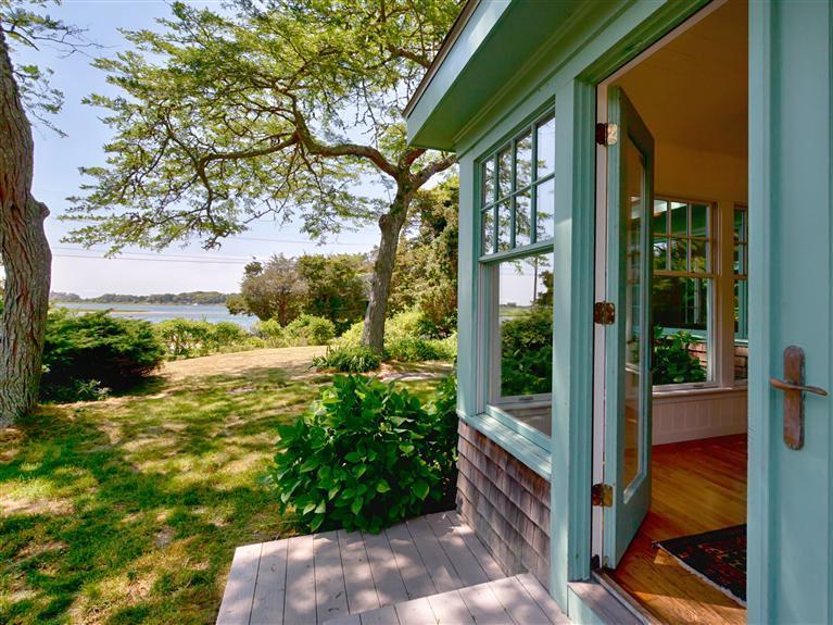 a view of balcony with yard