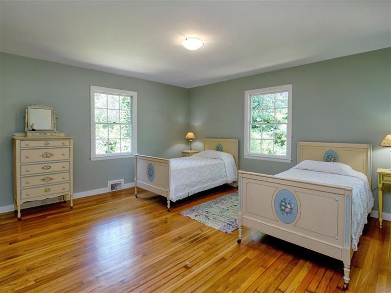 84 Old Dock Road Falmouth, MA 02540 - Photo 11 of 19 a bedroom with a bed and a tv