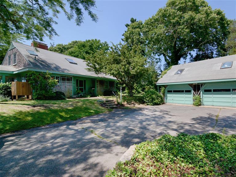 84 Old Dock Road Falmouth, MA 02540 - Photo 17 of 19 a view of a house with a yard