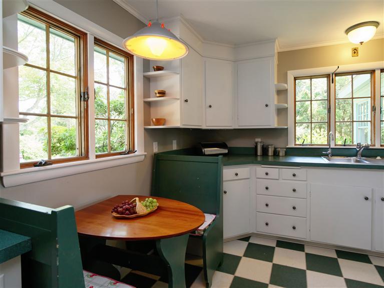 84 Old Dock Road Falmouth, MA 02540 - Photo 8 of 19 a kitchen with stainless steel appliances granite countertop a stove a sink and a window
