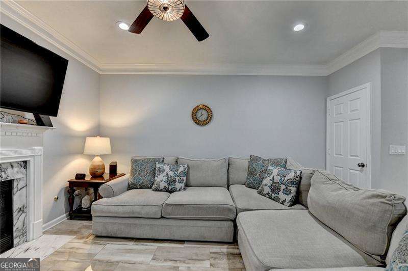 2066 Pinnacle Pointe Drive Norcross, GA 30071 - Photo 17 of 56 a living room with furniture and a flat screen tv