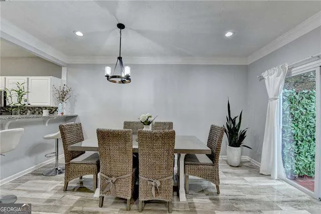 a view of a dining room with furniture